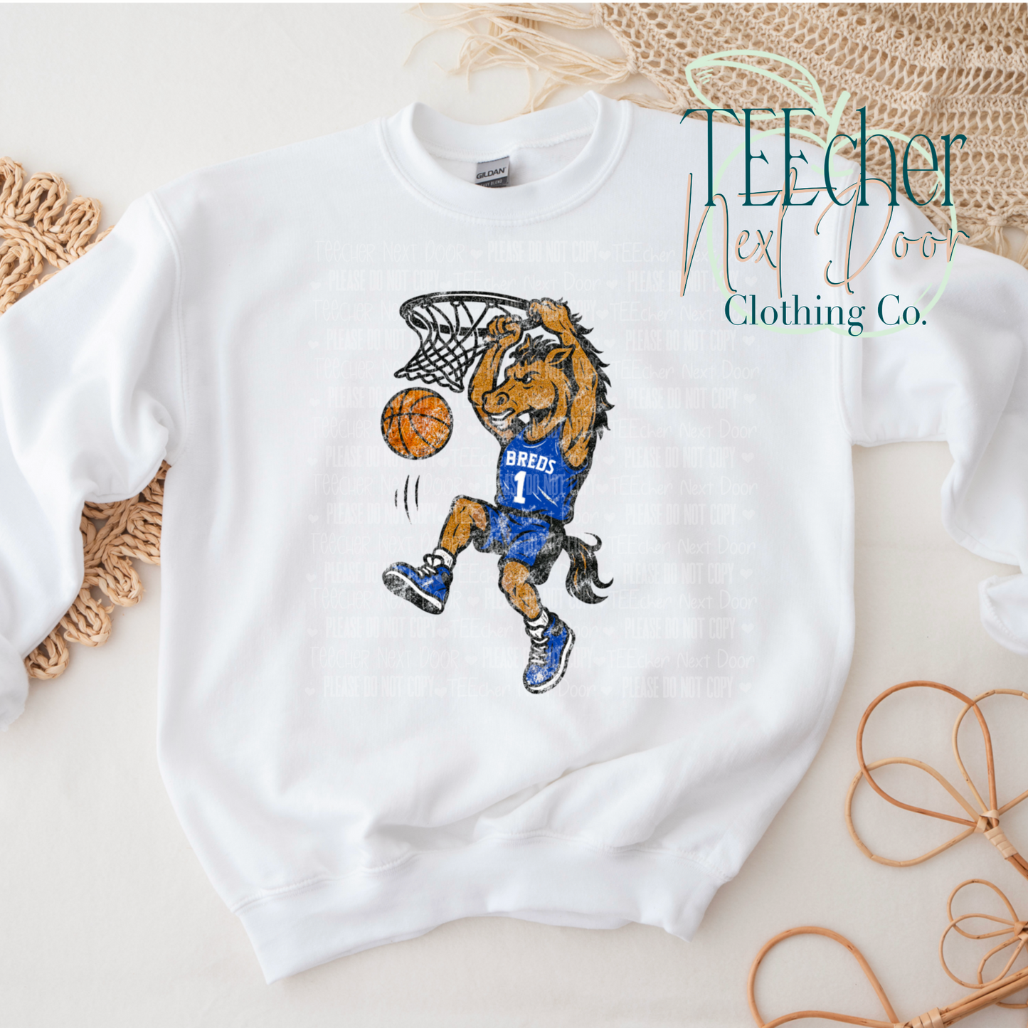 White sweatshirt with a cartoon horse playing basketball design with a BREDS jersey, branded 'TEEcher Next Level Clothing Co.'